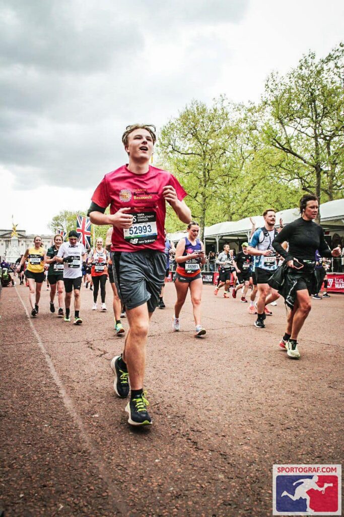Rafe running the London Marathon when he was 18 for Brain Tumour Research